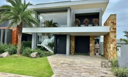 Casa em condomínio 4 dormitórios à venda centro xangri-lá/rs
