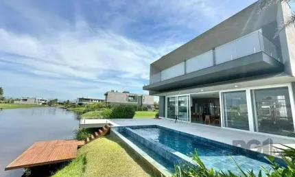 Sobrado Beira Lago com piscina e Deck com 457m² e 5 suítes no Condomínio Sense e