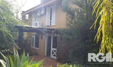 Casa em condomínio fechado com 3 quartos à venda na rua professor carlos de paula couto, 500, cavalhada, porto alegre, 220 m2 por r$ 1.250.000
