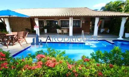 Casa de luxo em condomínio em Guarajuba (Monte Gordo) - Camaçari-BA: 5 quartos, 5 suítes, 1 sala, 5 banheiros, 1 vaga, 265m².