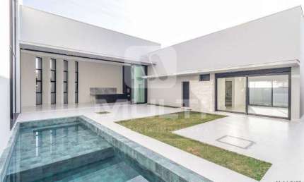 Casa em condomínio fechado com 3 quartos para alugar no Buritis, Uberlândia  por R$ 16.000