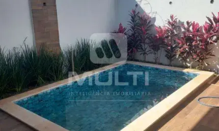 Casa em condomínio fechado com 3 quartos à venda no Novo Mundo, Uberlândia  por R$ 1.690.000