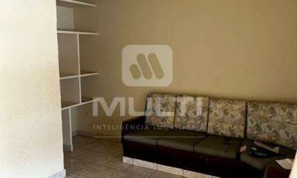 Casa com 5 quartos à venda no Osvaldo Rezende, Uberlândia  por R$ 400.000