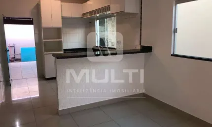 Casa com 3 quartos à venda no Jardim Holanda, Uberlândia  por R$ 550.000