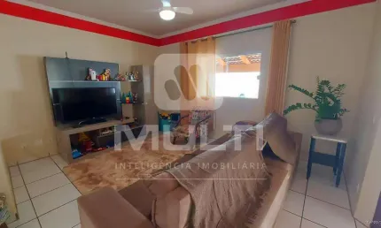 Casa com 4 quartos à venda no Santa Mônica, Uberlândia  por R$ 870.000