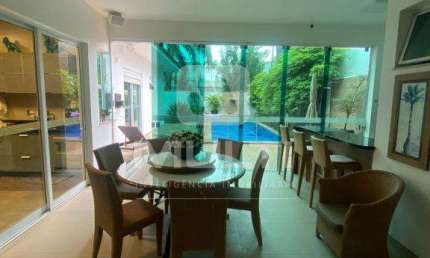 Casa em condomínio fechado com 4 quartos à venda no Jardim Karaíba, Uberlândia  por R$ 4.000.000