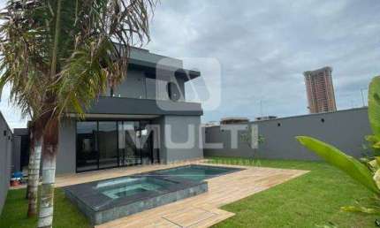 Casa em condomínio fechado com 4 quartos para alugar no Gávea, Uberlândia  por R$ 23.000