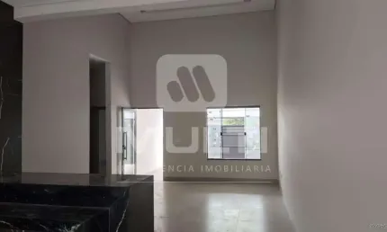 Casa com 3 quartos à venda no Residencial Liberdade, Uberlândia  por R$ 730.000
