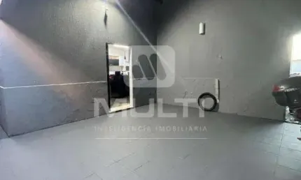 Casa com 3 quartos à venda no Santa Mônica, Uberlândia 