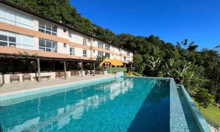 Casa em condominio com quadra de tênis e serviço de praia em Camburi, São Sebastião-SP: 3 quartos, 3 suítes, 2 salas, 3 banheiros, 2 vagas, 96,60m².