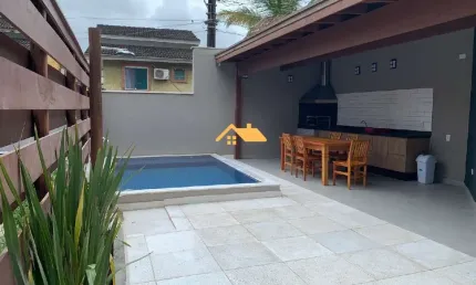 Casa  em condomínio Camburi: 4 quartos, 2 suítes, 2 salas, 3 banheiros, 2 vagas, 200m² em Camburi, São Sebastião-SP.