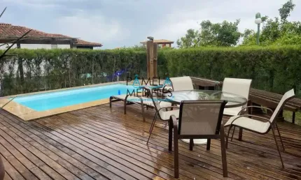 Casa 5 suítes condomínio pé na areia na Marina Armação de Búzios