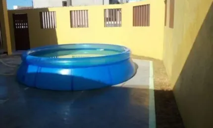 Casa na Praia do Sonho com 3 dormitórios, 2 suítes e 4 garagens.
