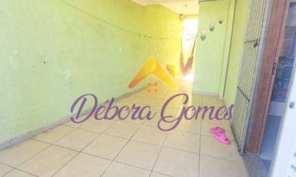 Casa para alugar em Guilhermina de 60.00m² com 2 Quartos, 1 Suite e 1 Garagem