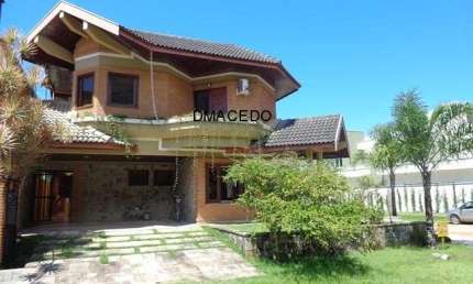 Casa para venda em Condominio Lagoinha de 320.00m² com 4 Quartos, 2 Suites e 2 Garagens