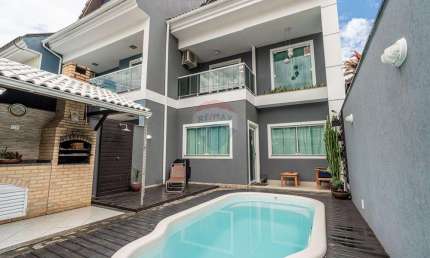Casa de Condomínio para venda em Taquara de 136.00m² com 3 Quartos, 1 Suite e 1 Garagem