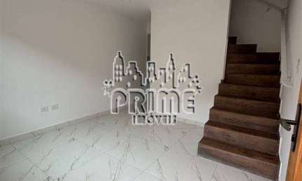Sobrado para venda em Guilhermina de 55.00m² com 2 Quartos, 1 Suite e 1 Garagem