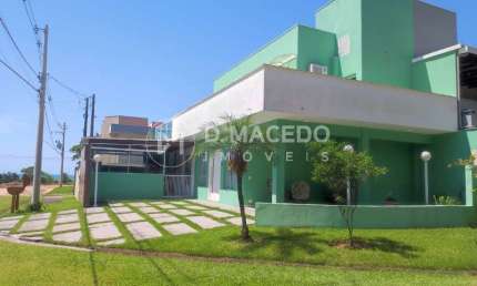 Casa para alugar em Condominio Lagoinha de 180.00m² com 4 Quartos e 4 Suites