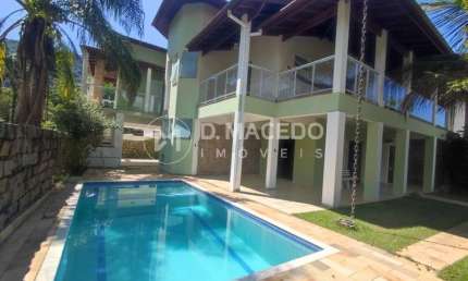 Casa para alugar em Condominio Lagoinha de 327.00m² com 4 Quartos, 2 Suites e 2 Garagens