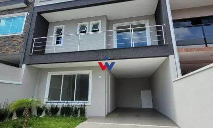 Sobrado para venda em Cidade Industrial de 175.00m² com 3 Quartos, 1 Suite e 2 Garagens