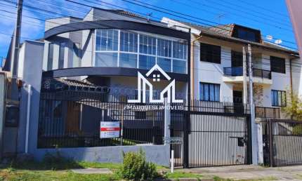 Casa para venda em Guabirotuba de 241.00m² com 3 Quartos, 1 Suite e 5 Garagens