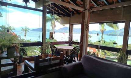 Casa para venda em Praia Da Enseada de 291.00m² com 4 Quartos, 2 Suites e 6 Garagens