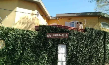 Sobrado para venda em Vila Galvão de 224.00m² com 4 Quartos, 3 Suites e 6 Garagens