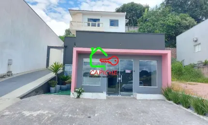 Casa para venda em centro de 346.00m² com 2 quartos, 1 suite e 3 garagens