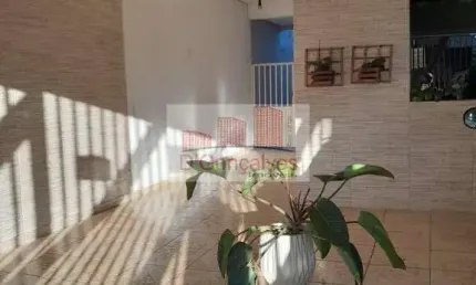 Sobrado para venda em centro de 125.00m² com 3 quartos, 1 suite e 2 garagens