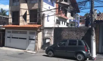 Sobrado para venda em centro de 140.00m² com 3 quartos, 1 suite e 2 garagens
