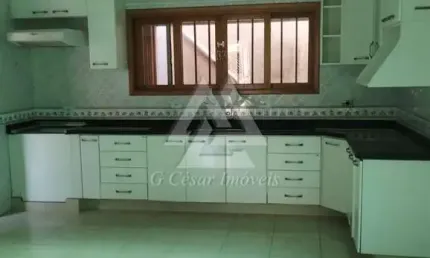 Sobrado para venda em centro de 321.00m² com 2 quartos, 2 suites e 2 garagens