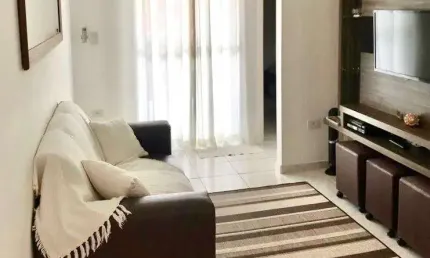 Apartamento mobiliado com 02 dormitórios, próximo a Praia Grande