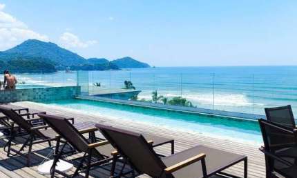 APARTAMENTO COM 02 DORMITÓRIOS SACADA VISTA PARA O MAR