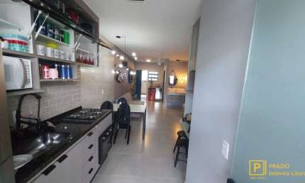 Apartamento na Praia das Toninhas com 2 dormitorios sendo uma suíte, 2 vagas de garagem