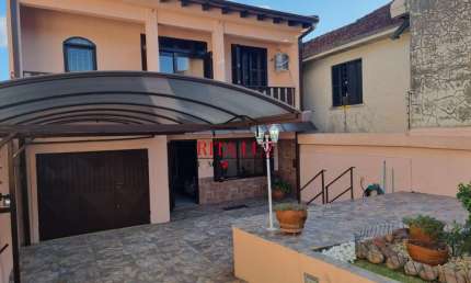 Casa com 4 quartos à venda na Rua Coronel Leonardo Ribeiro, 90, Glória, Porto Alegre por R$ 600.000