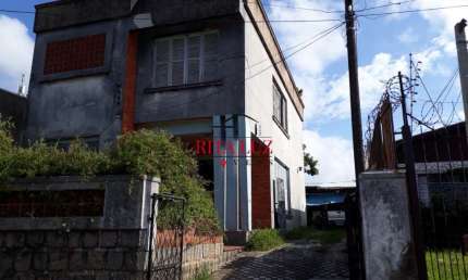 Casa com 3 quartos à venda na Rua Caldre e Fião, 524, Santo Antônio, Porto Alegre por R$ 580.000