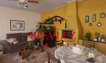 Casa em condomínio fechado com 3 quartos à venda na Rua Roque Gonzales, 217, Jardim Botânico, Porto Alegre por R$ 795.000