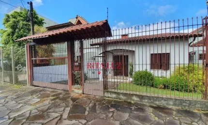 Casa com 3 quartos à venda na rua pedro boticário, 176, glória, porto alegre por r$ 600.000