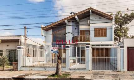 Casa com 4 quartos à venda na Rua Nossa Senhora das Graças, 35, Glória, Porto Alegre por R$ 997.000
