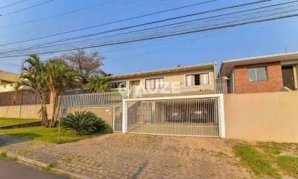 Casa à venda com 4 dormitórios Área de 360 m² no coração do Jardim das Américas Curitiba/PR