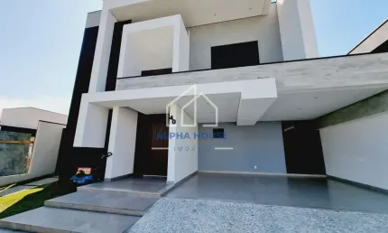 Casa à venda, Residencial Ouroville, Taubaté, com três suítes e piscina.