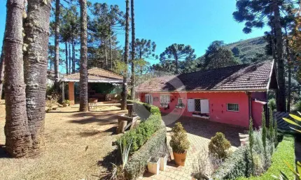 Casa com 3 dormitórios, 240 m² - venda por R$ 1.100.000,00 ou aluguel por R$ 20.110,00/mês - Descansópolis - Campos do Jordão/SP