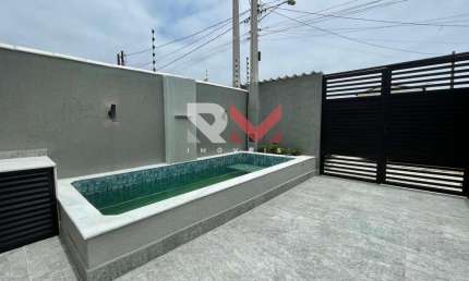 Casa com área de lazer e piscina em boa localização no bairro Santa Julia - Itanhaém/SP.