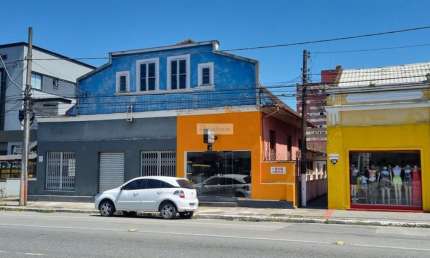 Imóvel comercial em plena avenida Getúlio Vargas com 2 casas e 5 salas comerciais
