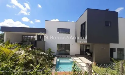 Casa moderna com 3 suítes, piscina aquecida e vista para mata nativa em condomínio fechado em valinhos