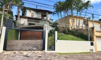 Casa com 3 quartos à venda no Ouro Branco, Novo Hamburgo  por R$ 890.000
