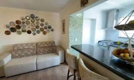 Apartamento no bairro Novo Mundo Curitiba com área útil de 68,09m², sendo 3 quartos (1 suíte), sala 2 ambientes com sacada, cozinha planejada, armários planejados nos quartos, 2 vagas de garagem.