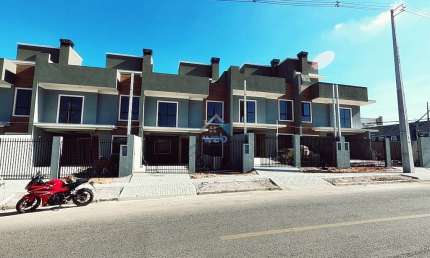 Casa com 3 quartos à venda na Rua Rodolfo Bernardelli, 347, Uberaba, Curitiba por R$ 690.000