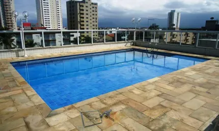 Apartamento prédio com piscina 2 dormitórios sendo 1 suite para venda em tupi praia grande-sp