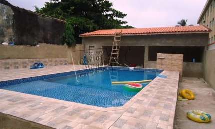 Casa com piscina próximo a praia para Venda em Praia Grande 3 dormitórios sendo 1 suite